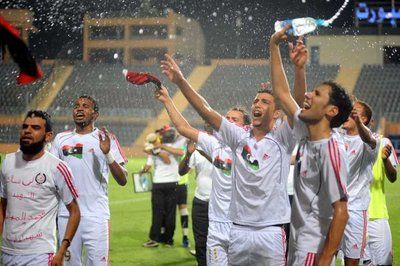 منتخب ليبيا يحتفل بفوز على موزمبيق بالقاهرة