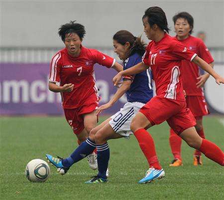 صورة من مباراة اليابان وكوريا الشمالية