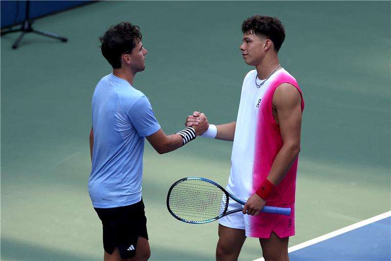 دومينيك ثيم وبن شيلتون