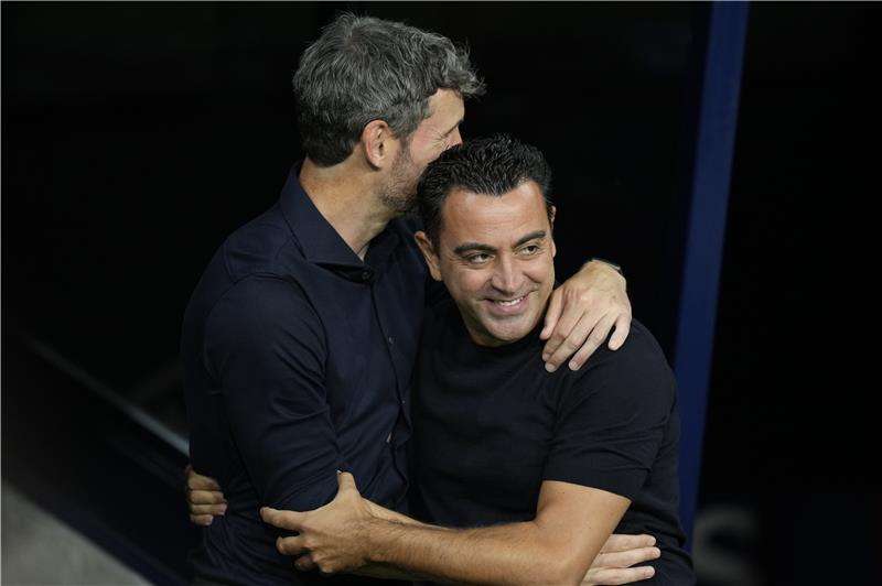 تشافي وفان بوميل