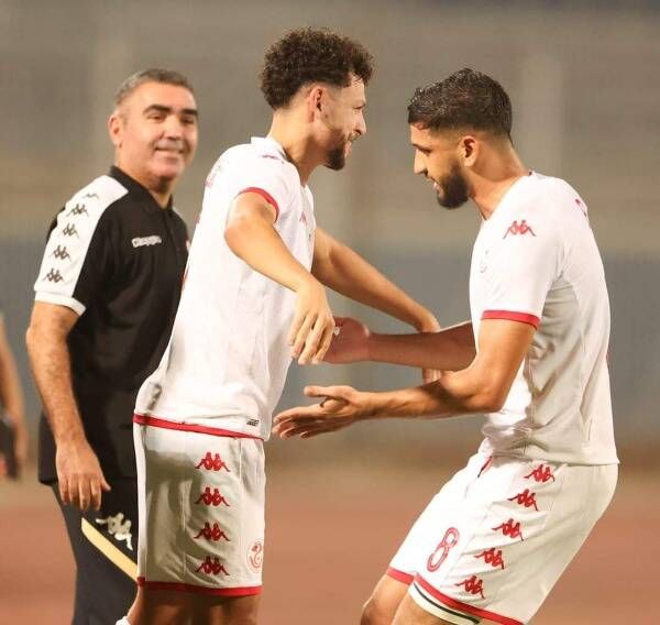 جلال القادري مع لاعبي تونس