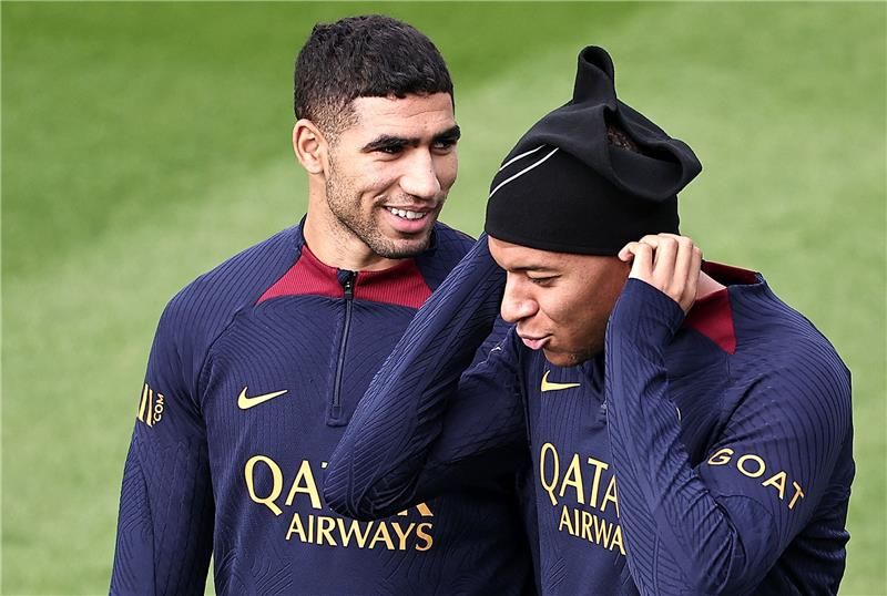 أشرف حكيمي ومبابي