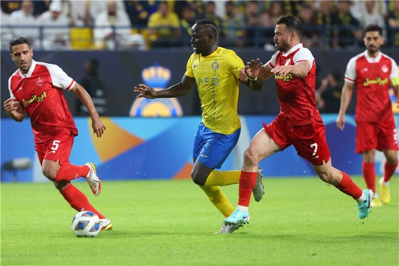 من النصر وبيرسيبوليس