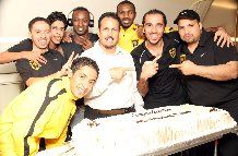 الجهني مع اللاعبين