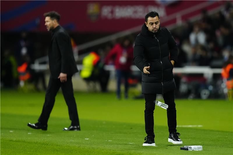 تشافي وسيميوني مدربا برشلونة وأتلتيكو - أرشيفية