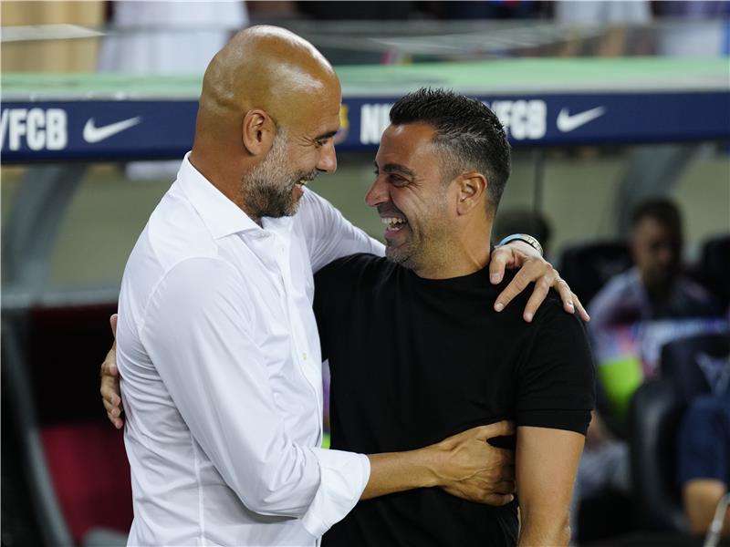 بيب جوارديولا وتشافي