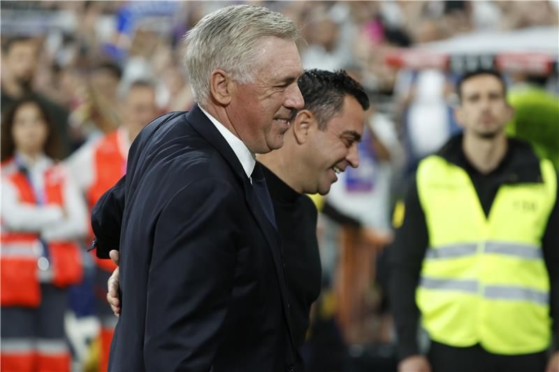 تشافي وأنشيلوتي