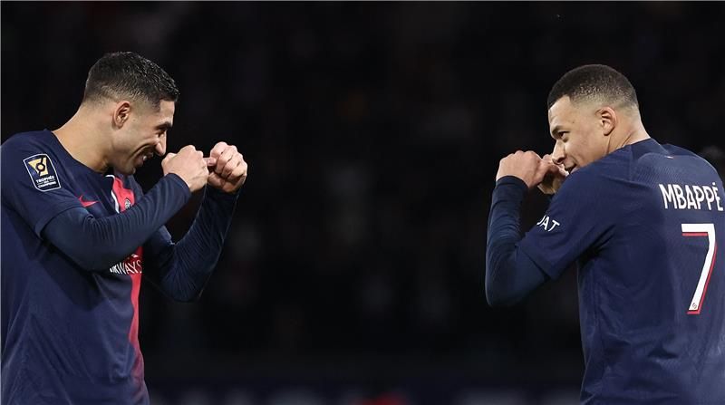 أشرف حكيمي ومبابي