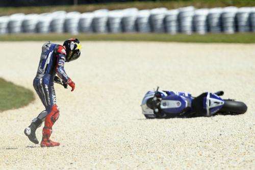2011-10-16t084641z_01_dgm43_rtridsp_3_motorcycling-prix-lorenzo_reuters