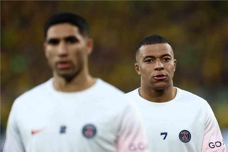 أشرف حكيمي ومبابي