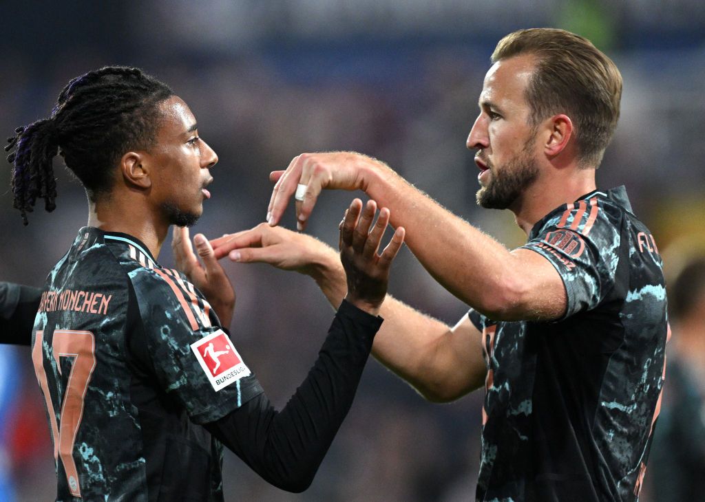 مايكل أوليسيه وزميله هاري كين