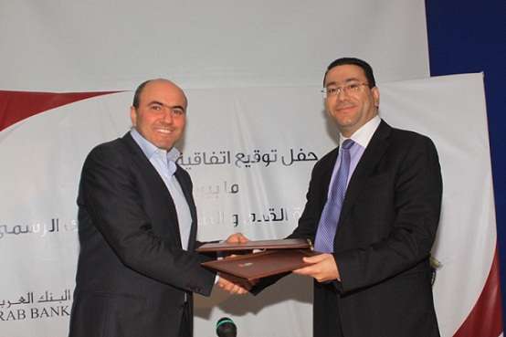 عليان والحاج يتبادلان الاتفاقية