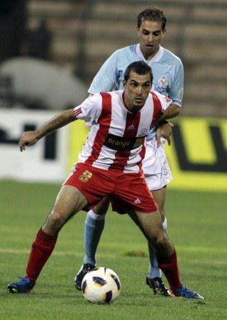 محمد خير في احد لقاءات فريقه شباب الأردن أمام الفيصلي