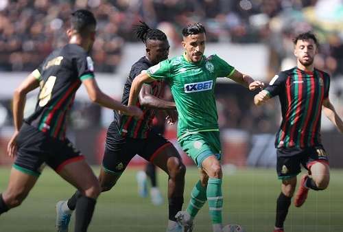 أرشيفية من مواجهة سابقة بين الرجاء والجيش