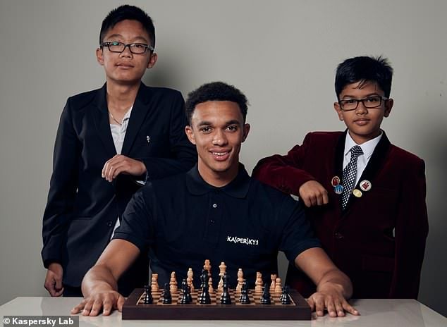 4786234-6243315-Alexander_Arnold_s_two_chess_coaches_are_nine_year_old_Shreyas_R-m-2_1538740068590