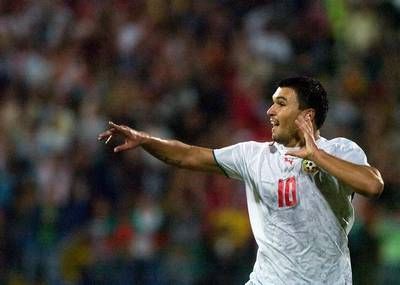 البلغاري فاليري بوزينوف يحتفل بعد تسجيله الهدف الاول في مرمى سلوفينيا