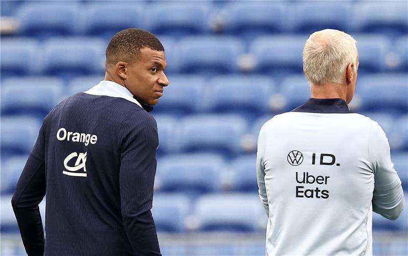 مبابي وديشامب