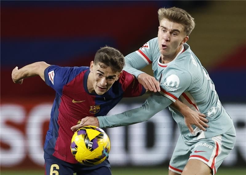 أتلتيكو مدريد وبرشلونة