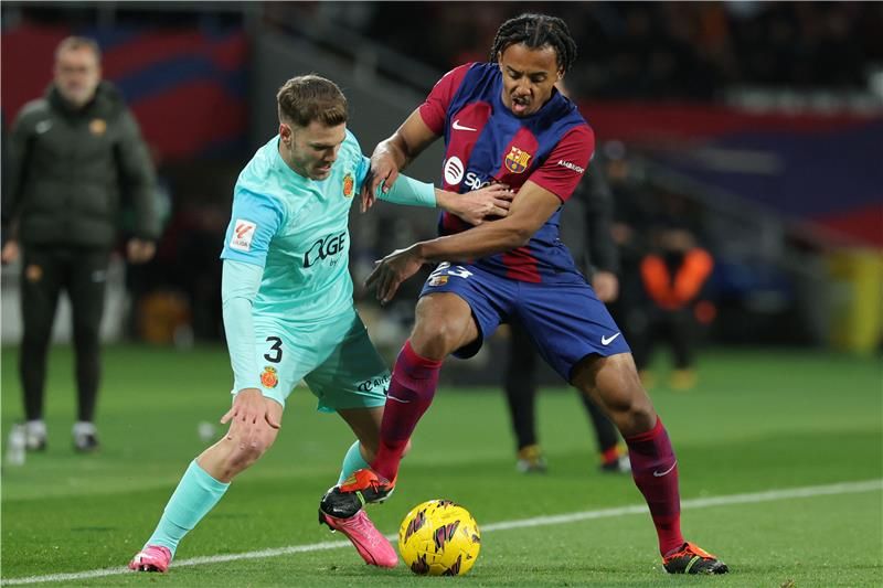 جانب من مباراة سابقة بين برشلونة ومايوركا