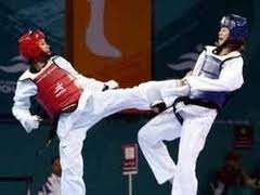 التايكوندو المصري ( يسار) حصل على برونزية العالم 