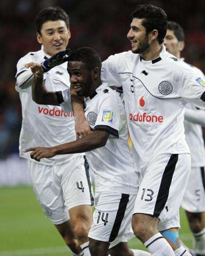 2011-12-11t083452z_01_toy110_rtridsp_3_soccer-world-club_reuters