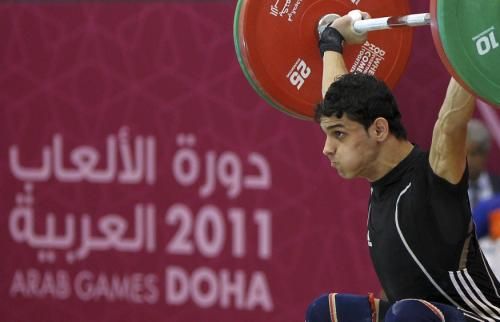 2011-12-13t160111z_01_sjs13_rtridsp_3_weightlifting_reuters