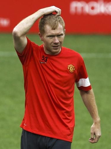 2011-05-312011-05-31t103101z_01_sin400_rtridsp_3_soccer-england-united-scholes_reuters
