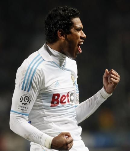 لاعب مارسيليا برانداو سعيد بالتسجيل فى مرمى ليون