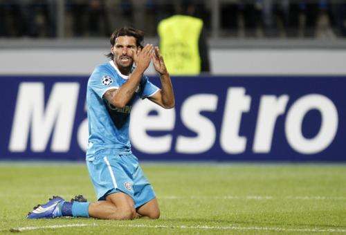 2011-09-28t182610z_01_stp21_rtridsp_3_soccer-champions_reuters