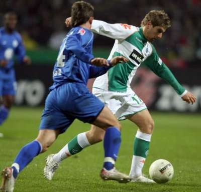 جانب من مباراة بريمن وضيفه فولفسبورج