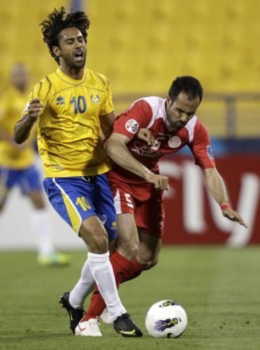 2012-04-04t174127z_01_qa07_rtridsp_3_soccer_reuters