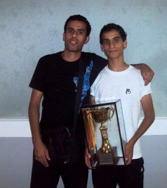 أبو غوش ومدربه فارس العساف