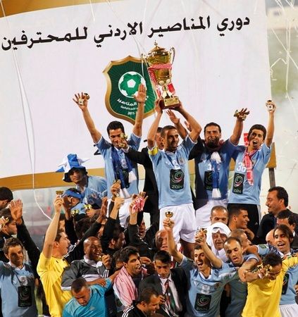 الفيصلي بعد تتويجه باللقب 