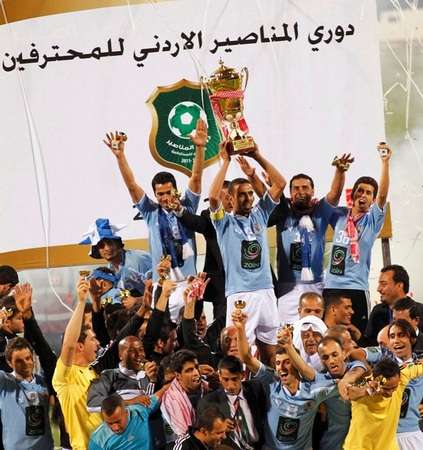 الفيصلي بعد تتويجه باللقب