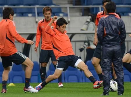 شينجي كاجاوا في التدريب الأخير للمنتخب الياباني بأستاد سايتاما