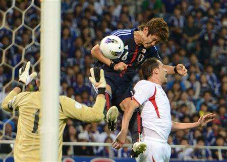 يوزو كوريهارا عند إحرازه الهدف السادس بمرمى الأردن