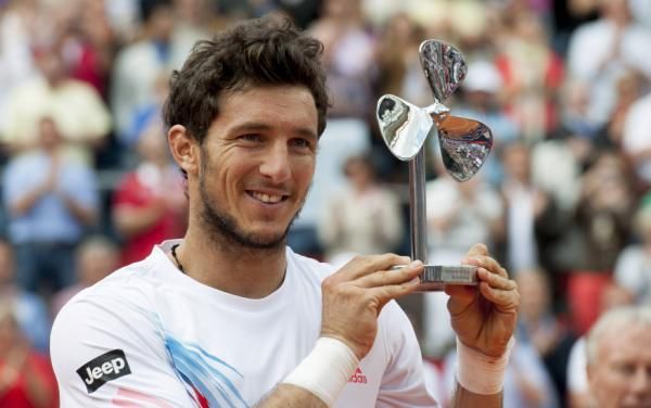 2012-07-22t144922z_1393313445_gm1e87m1rc401_rtrmadp_3_tennis-men-hamburg_reuters