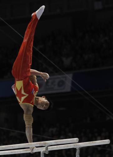 البطل الاولمبى الصينى  تينج هايبين 