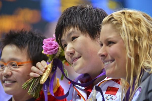 2012-07-28t201849z_1878173592_lm2e87s1kf32j_rtrmadp_3_oly-swim-sww4im-medals-day1_reuters