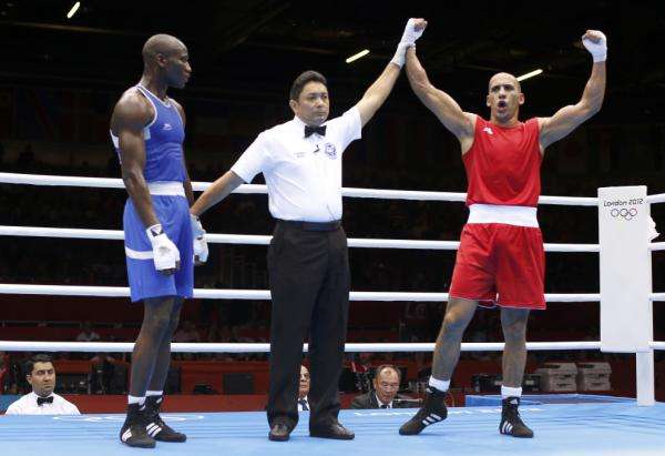 2012-07-30t143425z_1130650876_tb3e87u14h7e4_rtrmadp_3_oly-boxi-bxm81k-rounds-day3_reuters