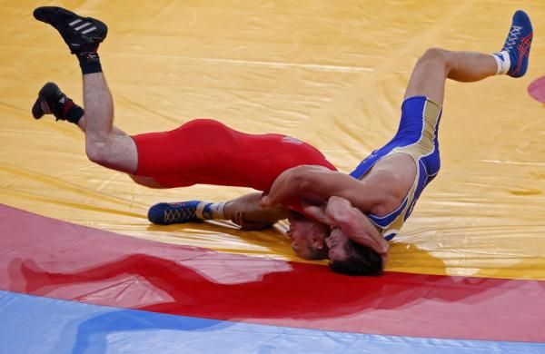 2012-08-05t131627z_1904420345_lm2e88510vb0g_rtrmadp_3_oly-wres-wrm74k-rounds-day9_reuters