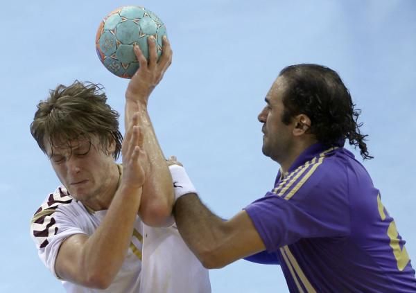 2012-08-28t184631z_588812778_gm1e88t07kg01_rtrmadp_3_handball_reuters