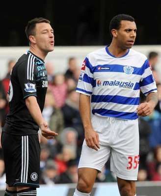 جون تيري " يسار " وجها لوجه مع أنتون فيرديناند 