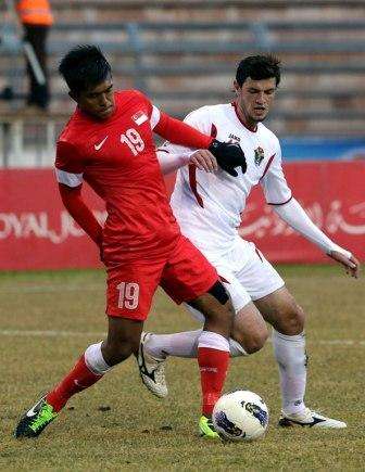 من مباراة الأردن وسنغافورة