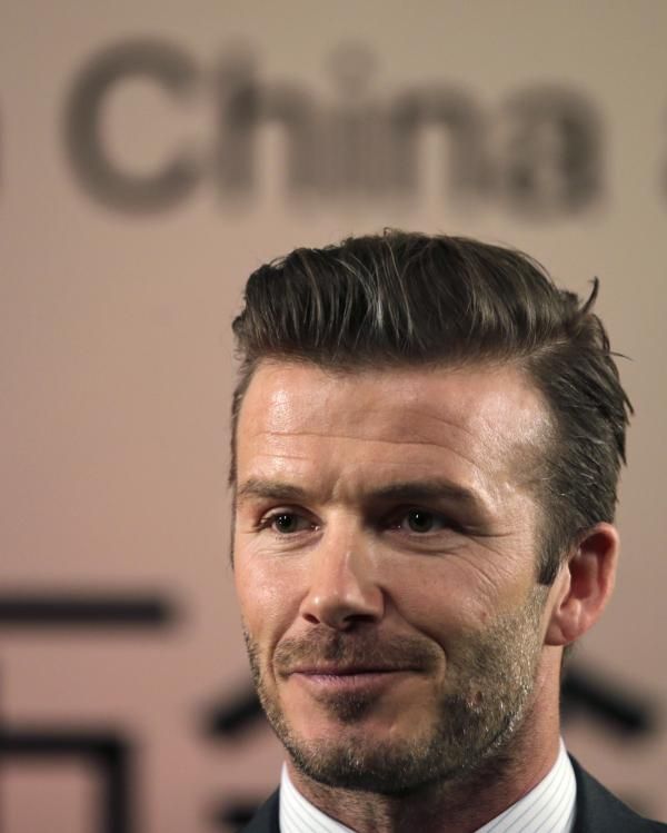 بيكهام عقب وصوله إلى بكين