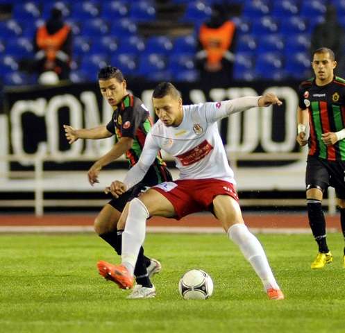 لقطة من مباراة سابقة بين الفتح والجيش