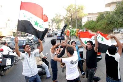 مسيرات فرح في بغداد أبتهاجاً بالتأهل لدور ربع النهائي