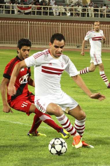 أحمد عيد عبدالملك مع لاعب خيطان