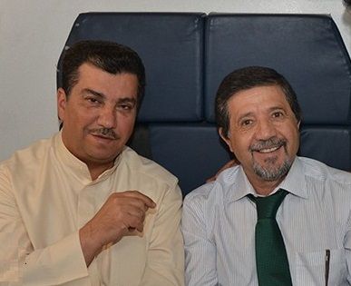 الكاظمي مع مدرب العربي روماو