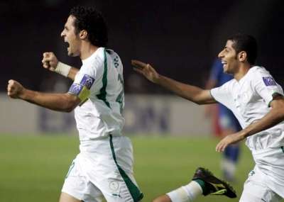 ياسر القحطاني يحتفل بالهدف السعودي الأول في مرمى أوزباكستان